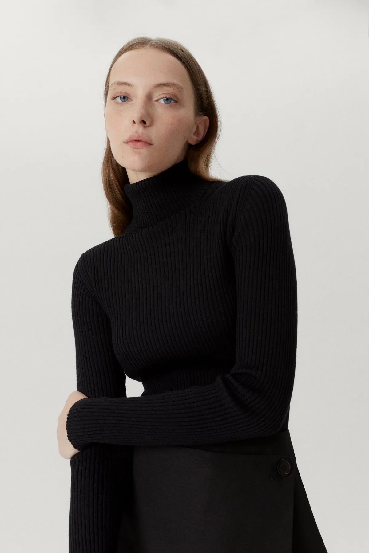 The Merino Wool Ribbed Roll neck